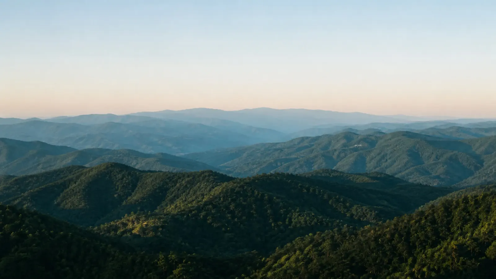 Layered Chiang Mai mountains at dawn